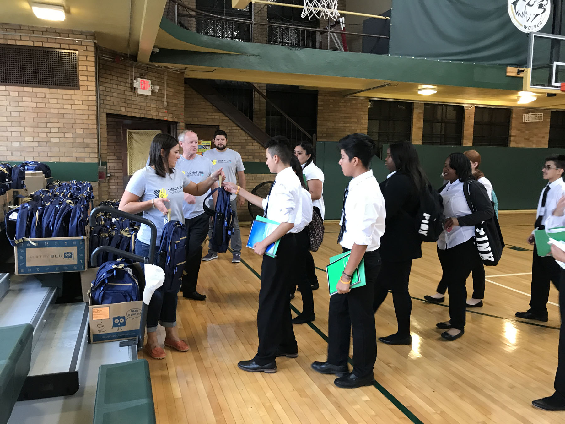 2017 - Detroit Cristo Rey students receiving their backpacks