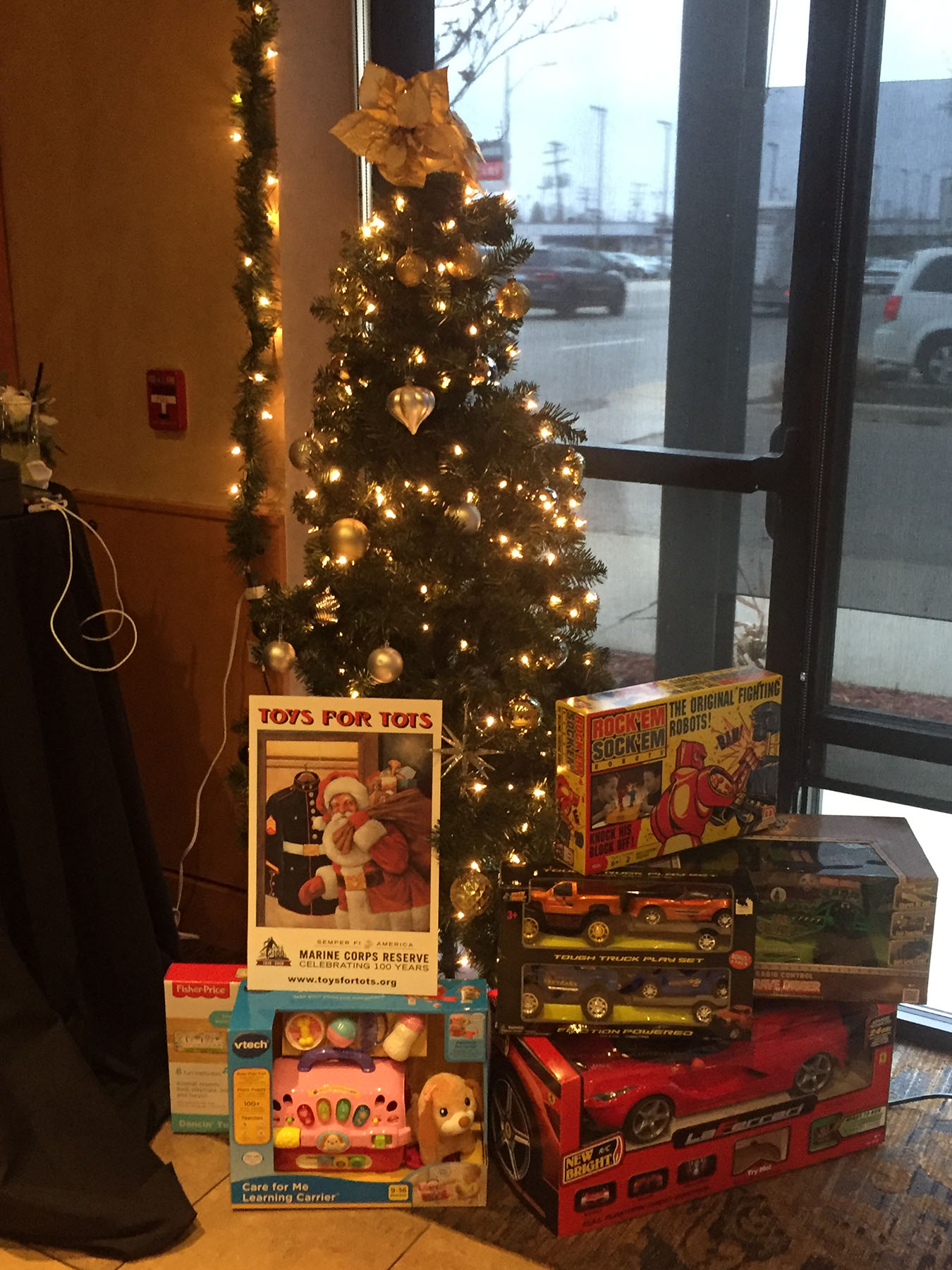 2017 - Toys and monetary donation collection for Toys For Toys at our holiday client party